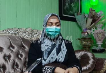 Erlina, warga yang mendukung pemindahan TPU