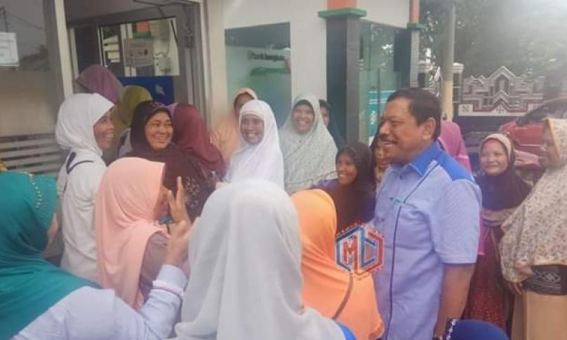 Bupati Bengkulu Utara, Ir. Mian sambangi warga lakukan penarikan dana PKH