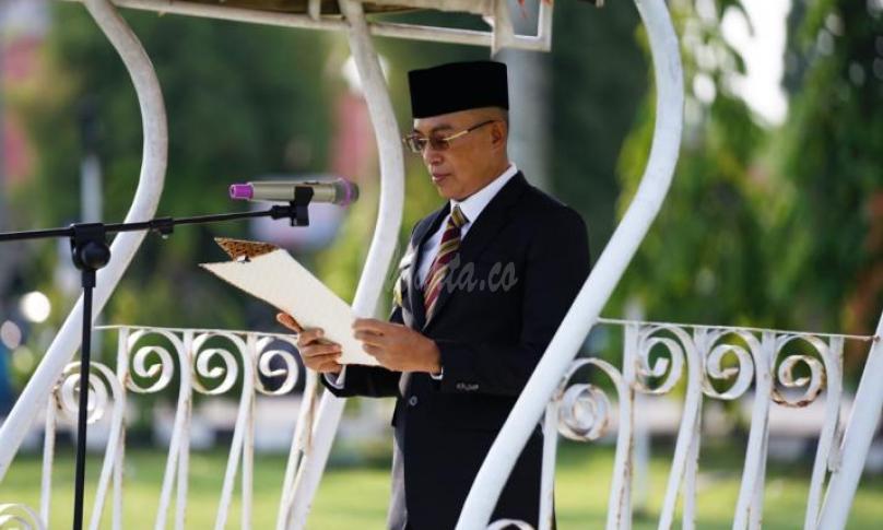 Bupati Bengkulu Selatan, Gusnan Mulyadi saat membacakan amanat Menteri Kominfo, Rudiantara