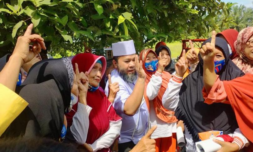 Helmi Hasan saat berkampanye di Pondok Kelapa