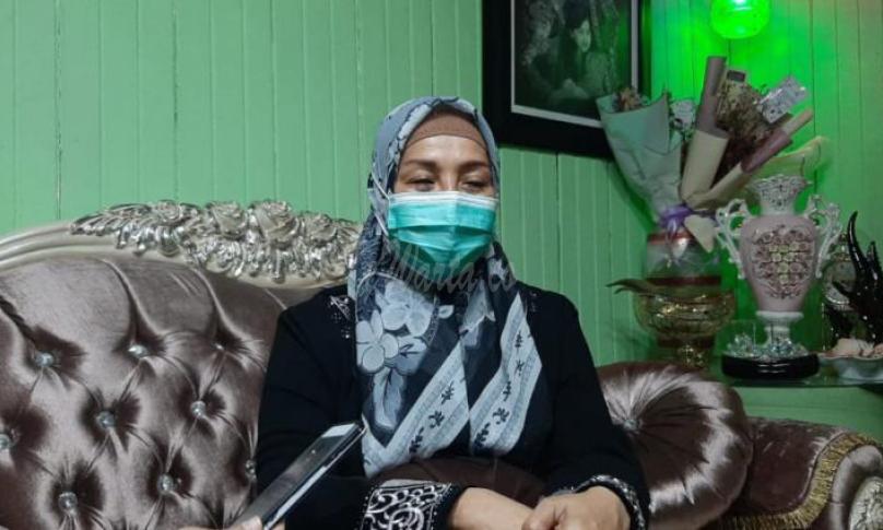 Erlina, warga yang mendukung pemindahan TPU
